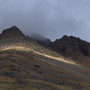 great gable, darkening sky, april 2010 Dark and threatening clouds hang over Great Gable's impressive southern flank. The shapely mountain is a key part of the landscape of Wasdale in Cumbria.