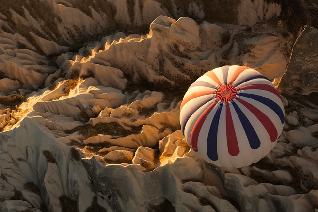 Up, Up and Away! above the mountains