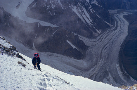 Looking down from K2 at 8000ms. Base camp is 10,000 ft down. An image of man in the face of awesome nature. Hinkes relates how this climber in the image didn’t make it – hit by an avalanche whilst attempting the summit.