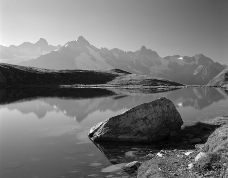 Photo 2. Repetition of the triangular shape on both the fore and far planes creates semantic liaison and helps integrate the image, while tonal perspective accentuates the depth.  The stone is located about the low-right golden point