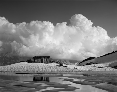 Photo 3. Contraposition of the soft round forms with continuous tonal transitions against the sharp shapes with abrupt tonal grades creates context to place the small refuge in between of the two.  Positioning it at the lower left golden point leaves no doubt on where the focal point is. 