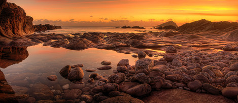 Aeon Flux' – afterglow light at Wembury's wave-channel reef – with the Great mew Stone beyond.
