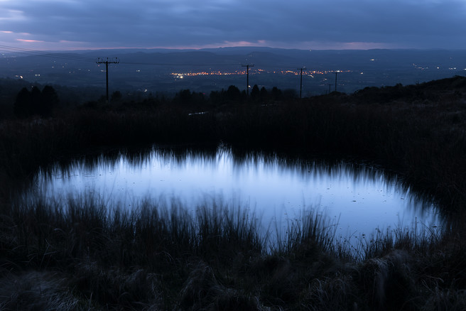 Kate Maxwell Disused mineshafts pockmark the hill overlooking Ludlow.