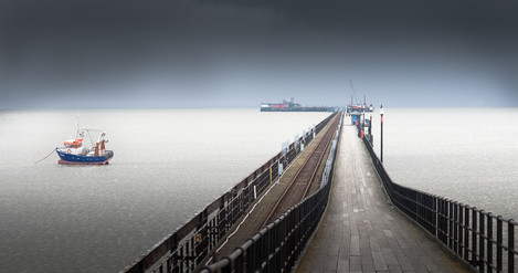 Pier and boat: This is entirely about producing an attractive image.