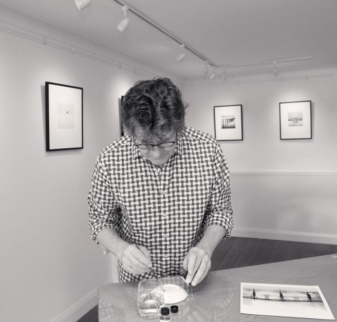 Michael Kenna Retouches Pont Des Arts, Study 1, Paris, France. 1987 In Bosham Gallery In 2019 © Henry Wells 1 Of 4